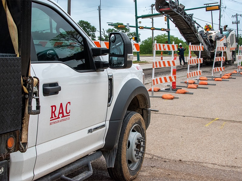 RAC pickup truck with FDR machine in background